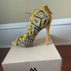 Used Madison by Shoedazzle lace up heels color multi yellow/ black/white 8.5US